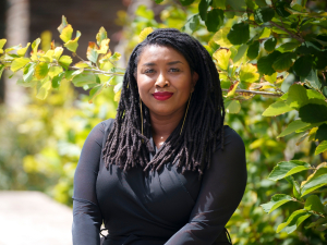 Zakiyyah Jackson smiles at the camera